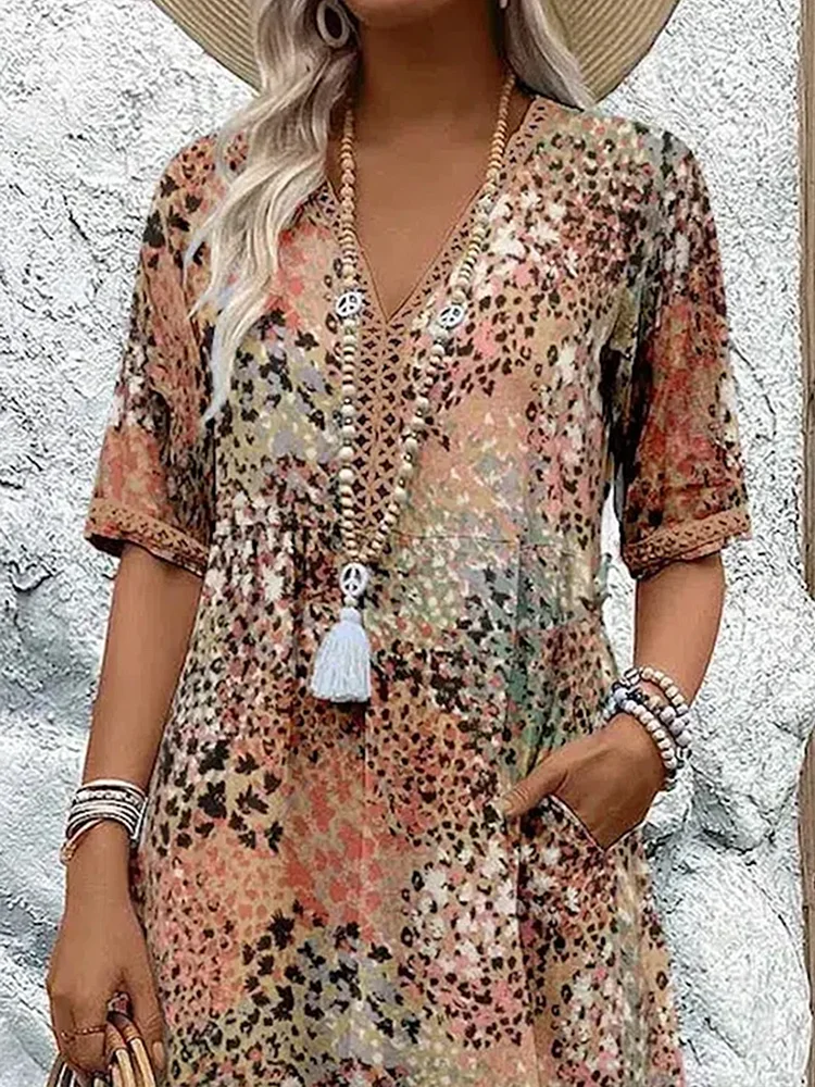 Summer-ready women's floral midi dress with a V-neck, a flowy a-line silhouette for casual comfort.