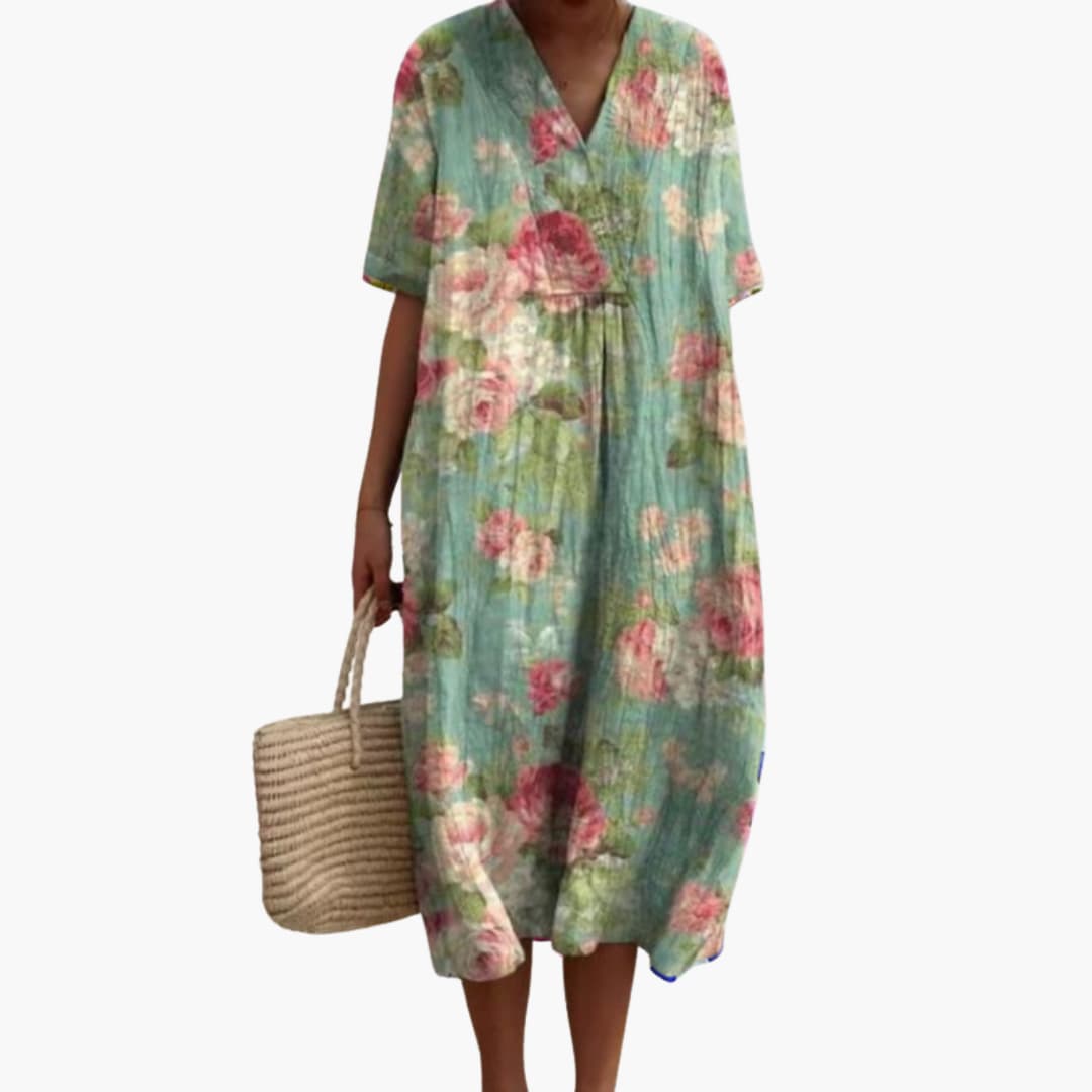 Relaxed fit women's floral V-neck midi dress, short sleeves, comfortable and stylish for summer occasions.