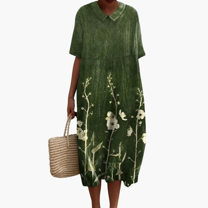 Comfortable women's oversized floral V-neck midi dress, short sleeves, perfect for travel & summer.