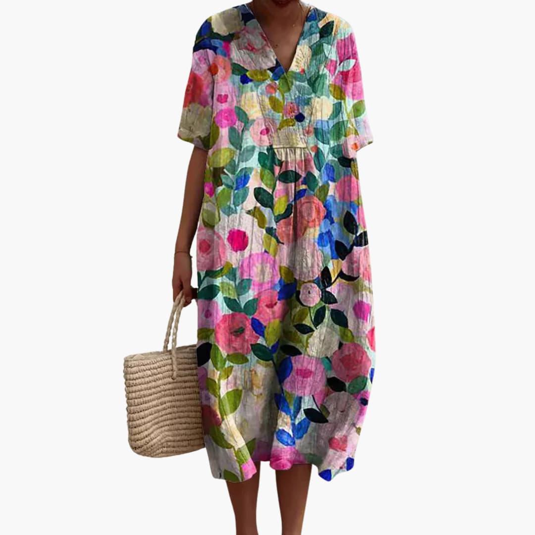 Stylish plus size women's floral midi dress, V-neck, short sleeves, flattering flowy oversized fit.
