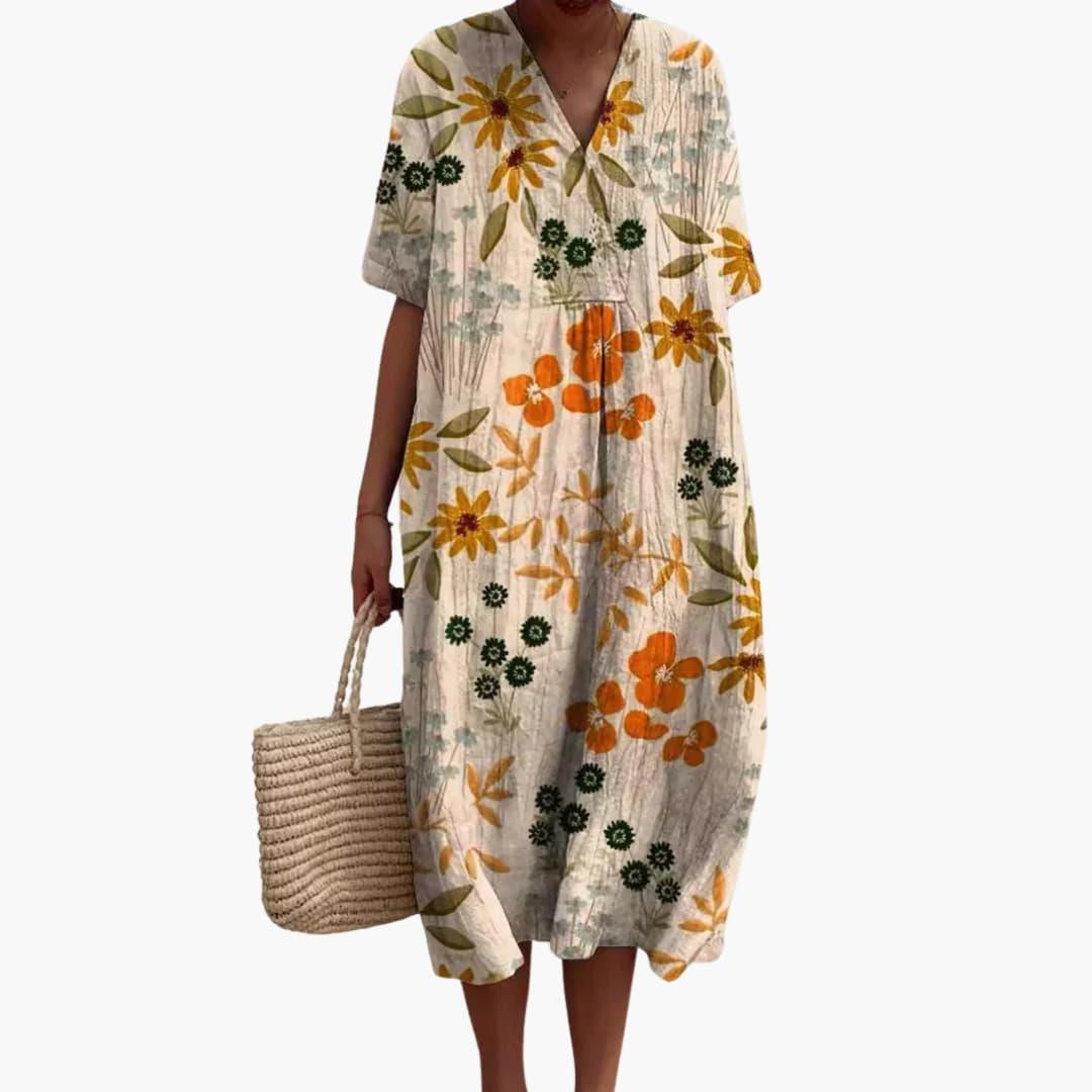 Casual summer women's floral V-neck midi dress, short sleeves, comfortable oversized design for daily wear.