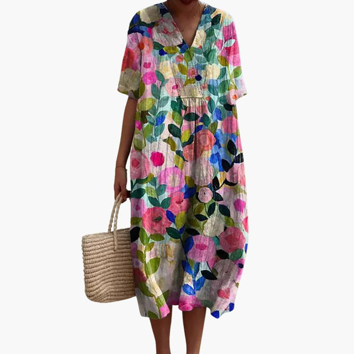 Stylish summer floral V-neck midi dress with pockets, ideal for vacation and travel.