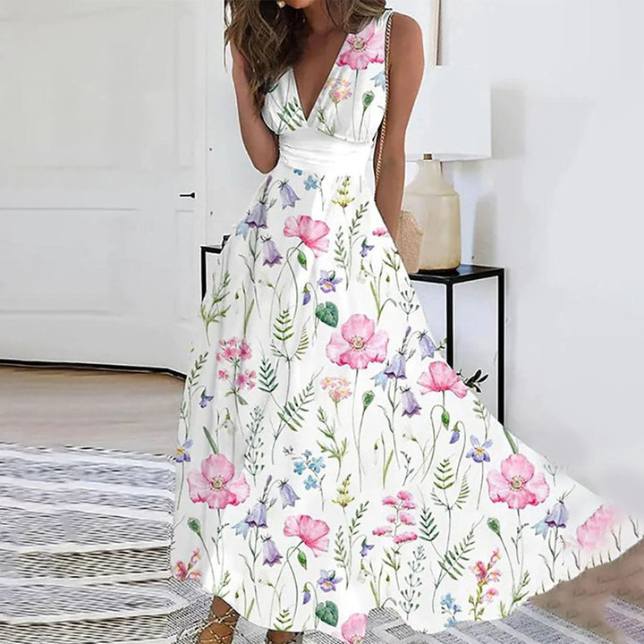 Chic women's V-neck sleeveless floral maxi dress, versatile for wedding guests or casual summer wear.