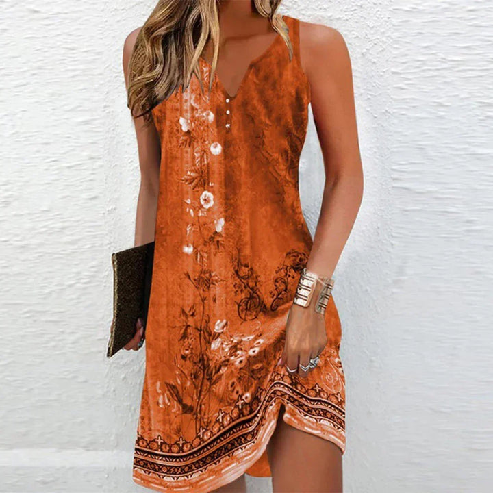 Elegant women's floral mini dress, sleeveless with a V-neck, perfect for summer parties & casual events.