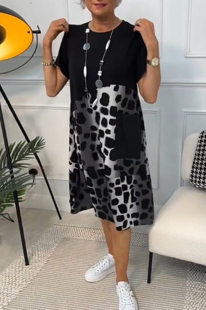 Women's Floral Waist-Defined Midi Dress, elegant & versatile for summer fashion.