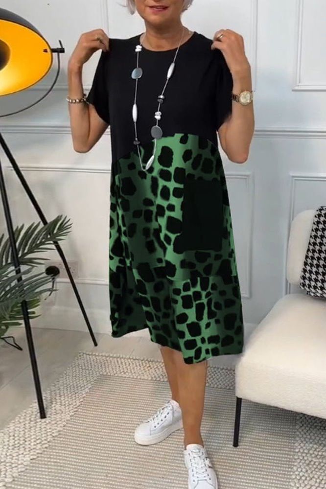 Model wearing a Women's Floral Waist-Defined Midi Dress, showing flowy midi length & defined waist.