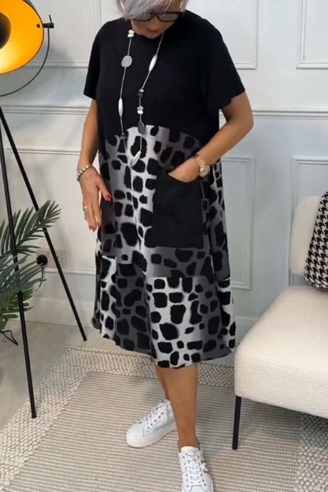 Versatile Women's Floral Midi Dress, waist-defined design for casual or elegant summer occasions.