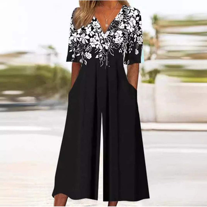 Elegant floral V-neck elbow sleeve palazzo jumpsuit for women. Ideal summer outfit for garden parties or brunch.