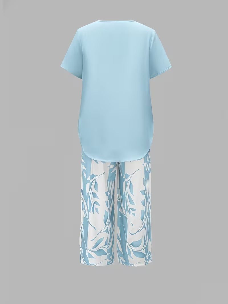 Boho-chic women's floral print wide-leg pant set with a relaxed V-neck short sleeve top.