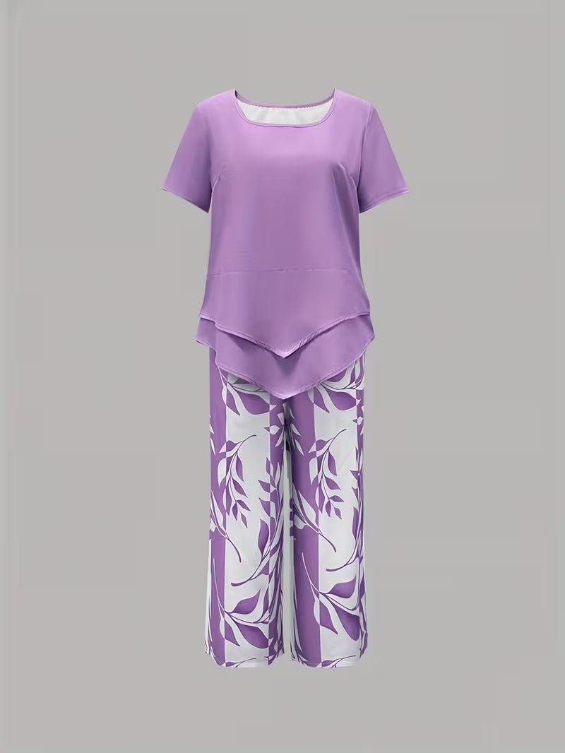 Summer-ready women's floral wide-leg pant set. Stylish two-piece V-neck top & pant for vacation.