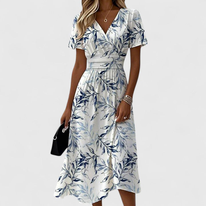 Boho chic women's floral print midi wrap dress featuring a flattering V-neckline and stylish flutter sleeves.