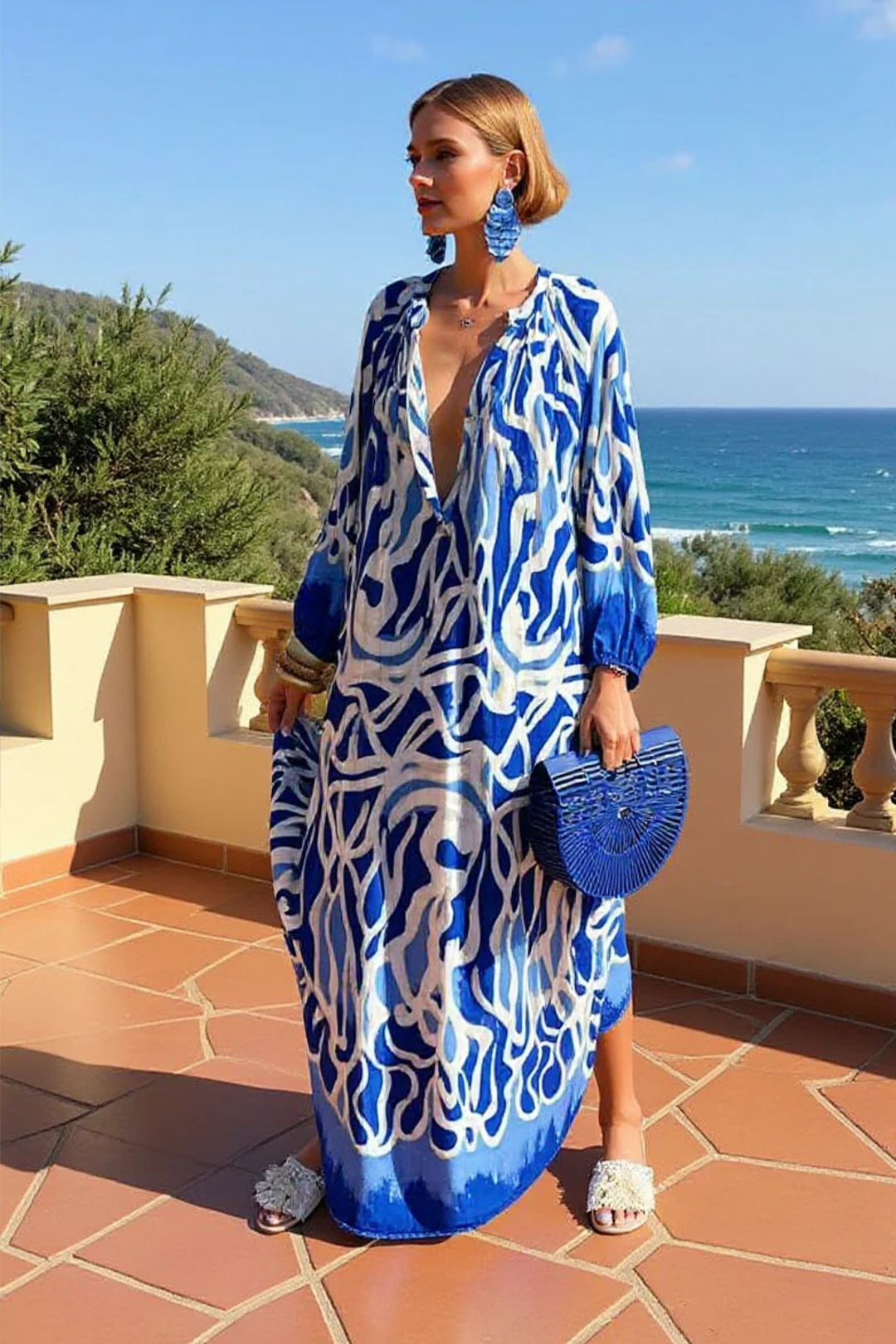 Comfortable & flowing women's relaxed fit abstract print V-neck kaftan maxi dress for casual summer fashion.