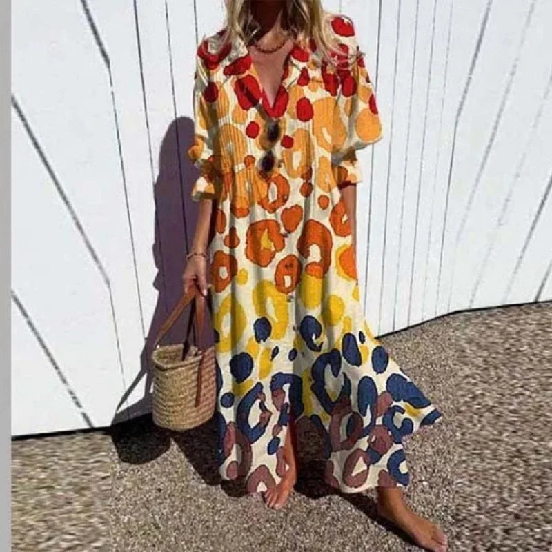 Floral print women's bohemian maxi dress. Flowing and comfortable, perfect for summer casual & resort wear.