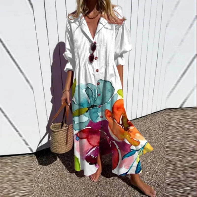 Long flowing women's bohemian maxi dress. Elegant floral print, comfortable for summer, vacation & resort wear.