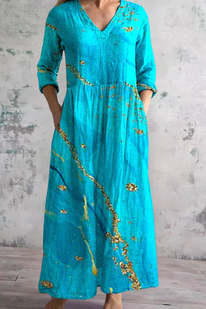 Spring/summer women's maxi dress. Comfortable, lightweight, and flowing, perfect for casual or elegant everyday wear.