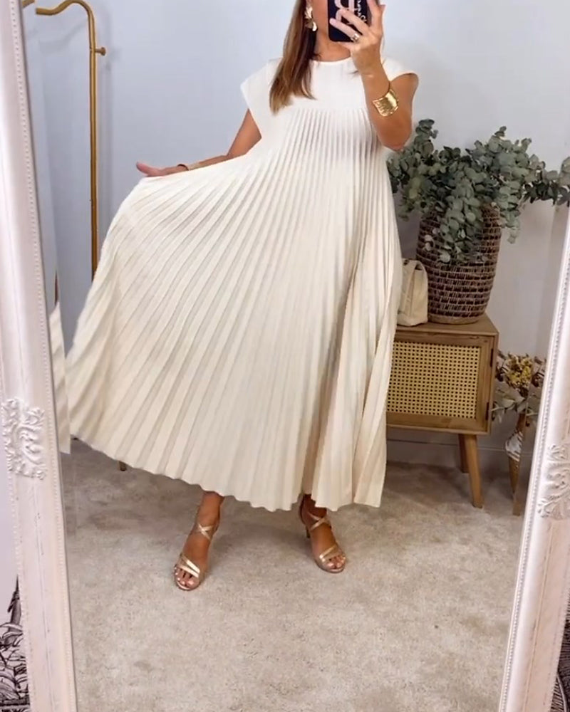 Women's timeless flowing pleated maxi dress. Elegant design, comfortable for all-day wear, versatile style.