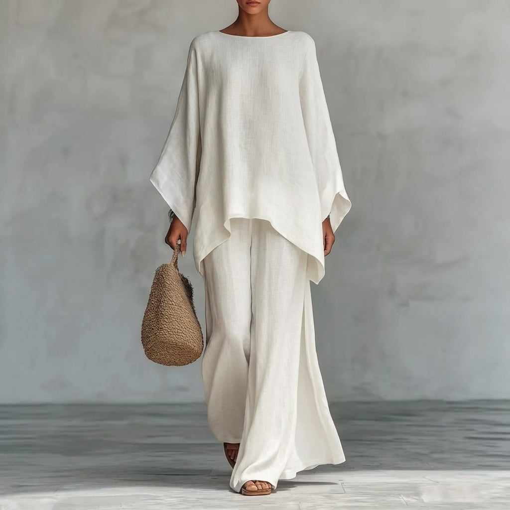 Elegant women's two-piece outfit: a flowing tunic top paired with a comfortable, stylish maxi skirt.