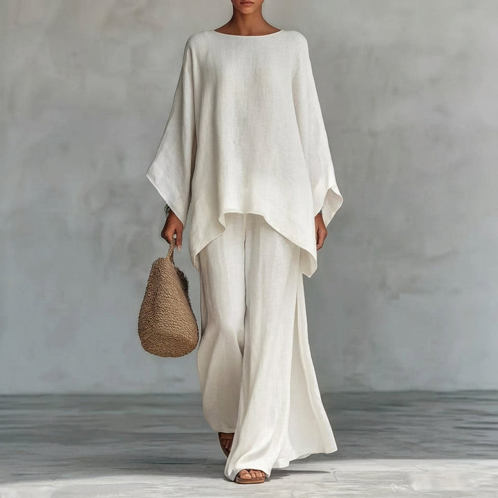 Elegant women's two-piece outfit: a flowing tunic top paired with a comfortable, stylish maxi skirt.