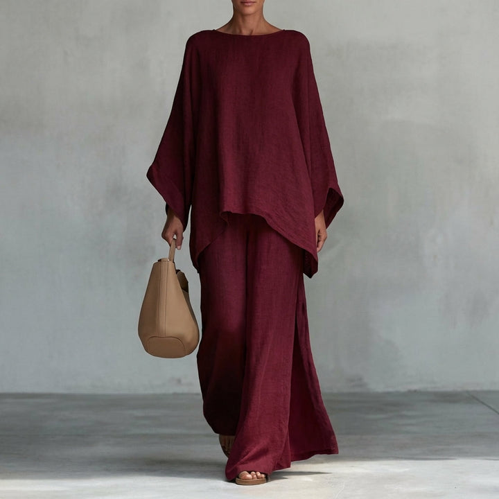 Stylish women's two-piece set including a loose tunic top and an elegant maxi skirt. Great for spring/summer.
