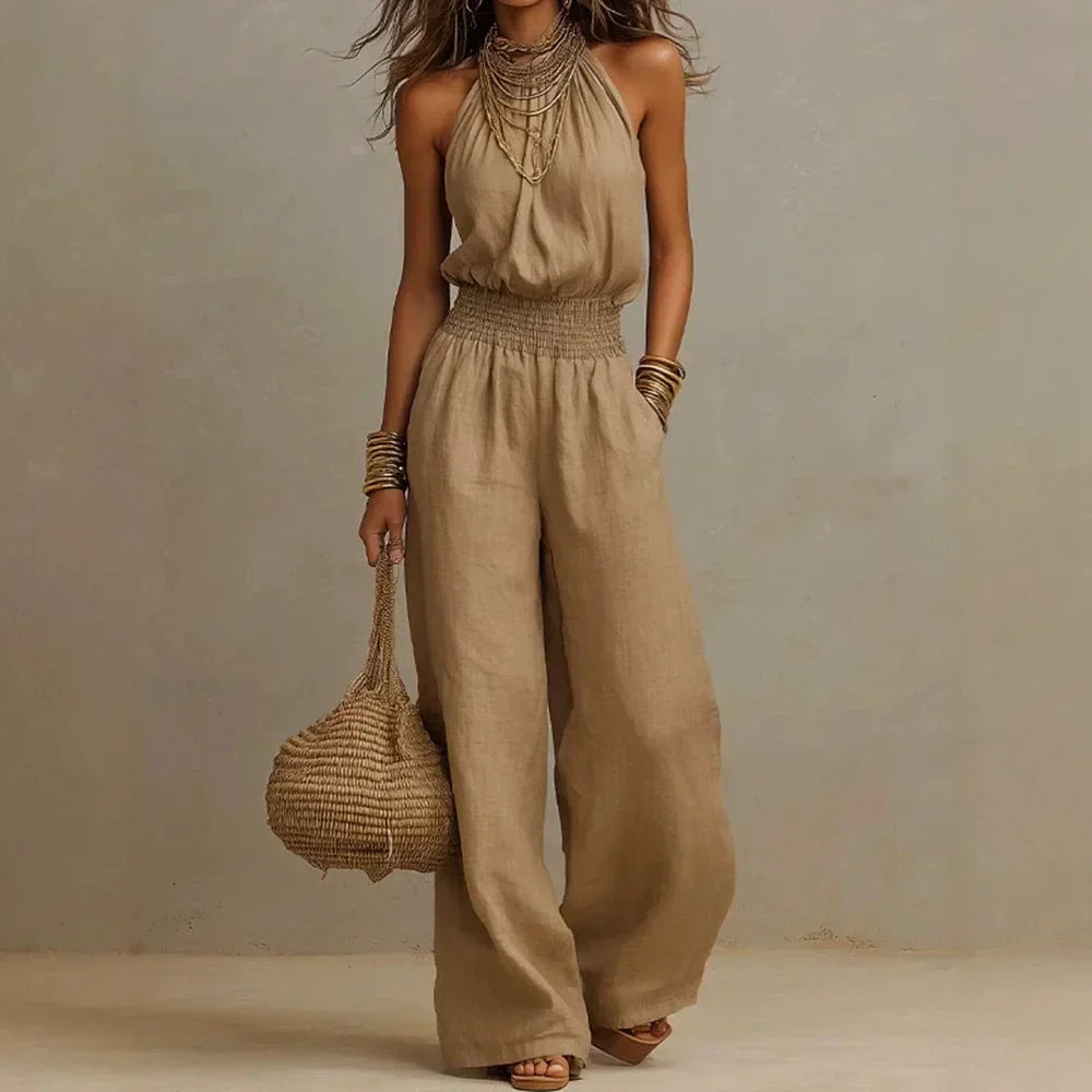 Women's flowing wide leg halter jumpsuit, perfect for summer vacation or elegant casual wear.