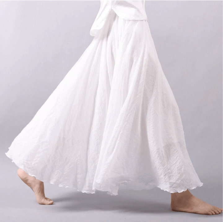 Women's flowy A-line maxi skirt for beach & summer fashion. Comfortable, elegant, and perfect for vacation.