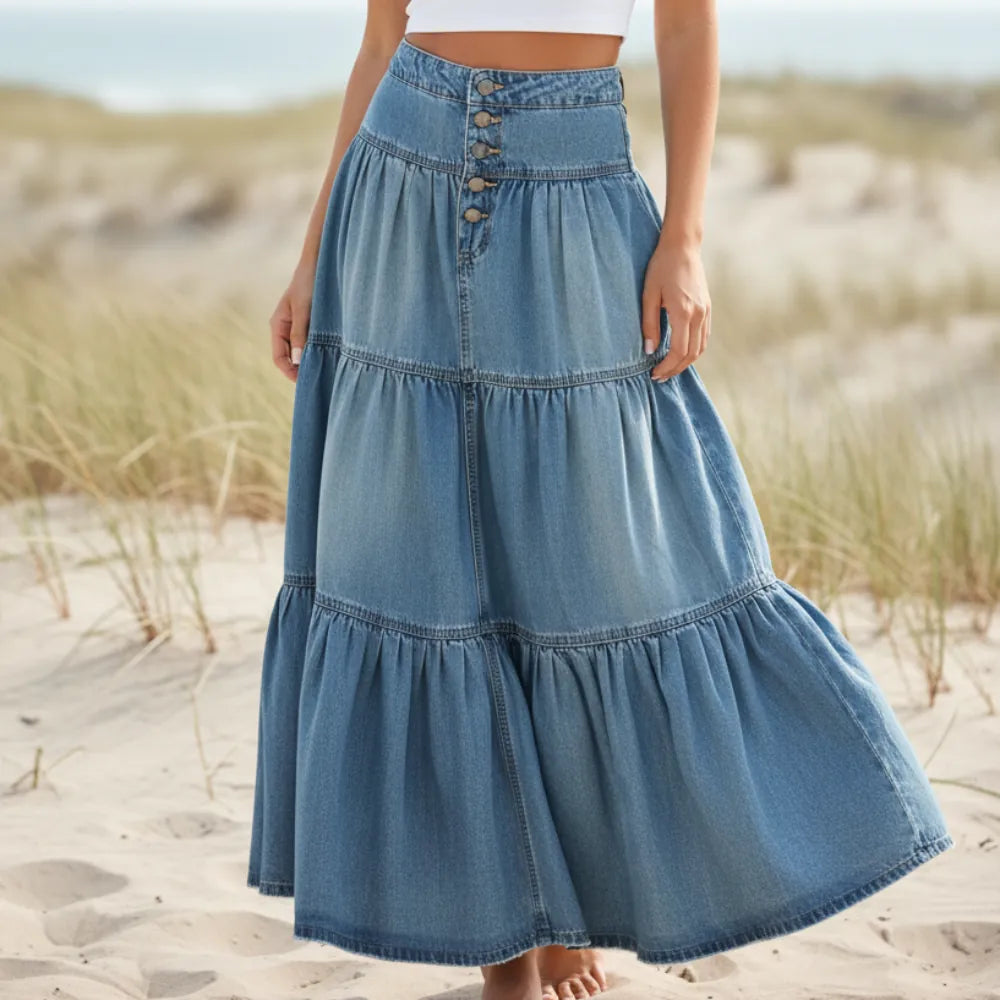 Women's flowy A-line ruffled high-waist maxi skirt in bohemian style, perfect for summer festivals.
