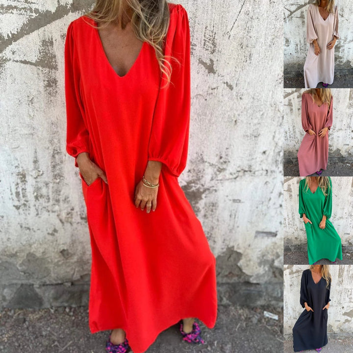 Casual to elegant, this women's flowy maxi dress has balloon sleeves, a V-neck, and pockets, great for any event.