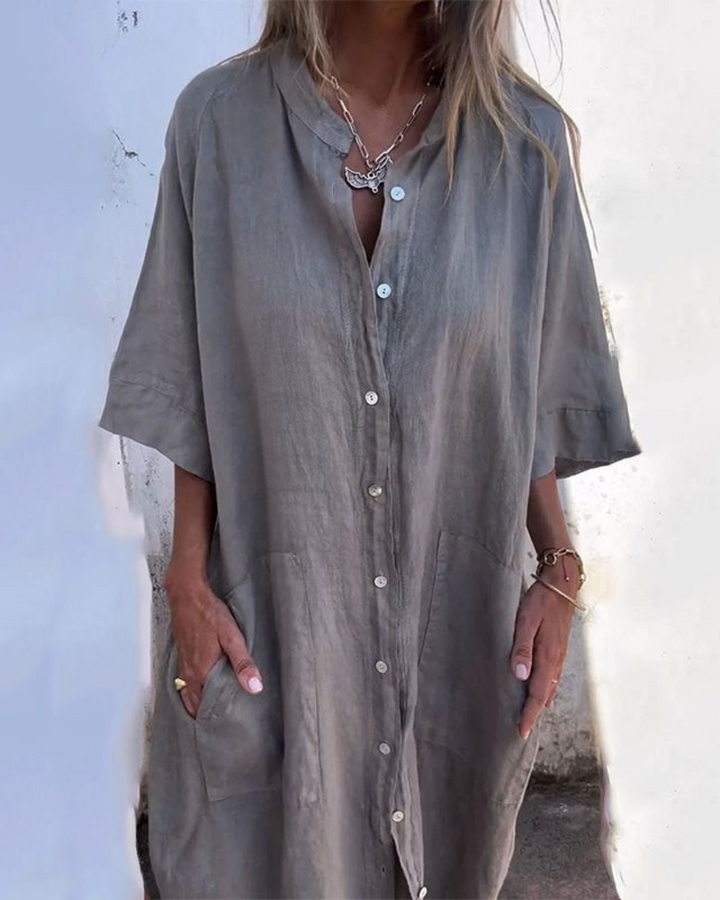 Women's flowy boho shirt dress with button closure & adjustable waist, perfect for casual summer wear.