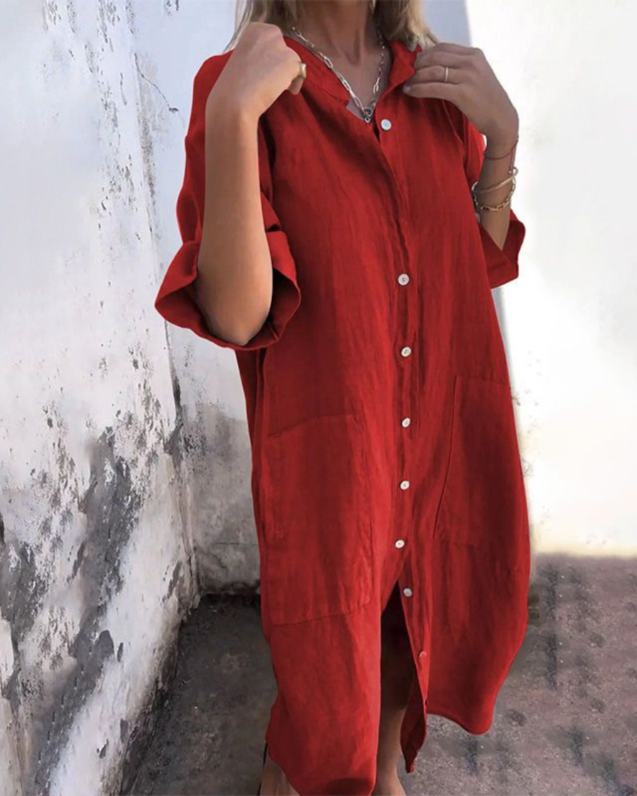 Elegant women's flowy boho shirt dress, a button-down midi with an adjustable waist for a flattering silhouette.