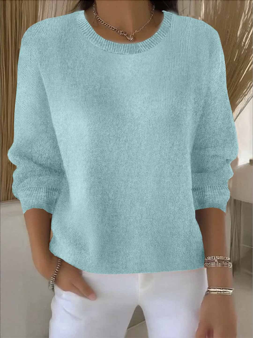 Chic women's long sleeve flowy sweater. Versatile knit top, perfect for autumn casual wear.