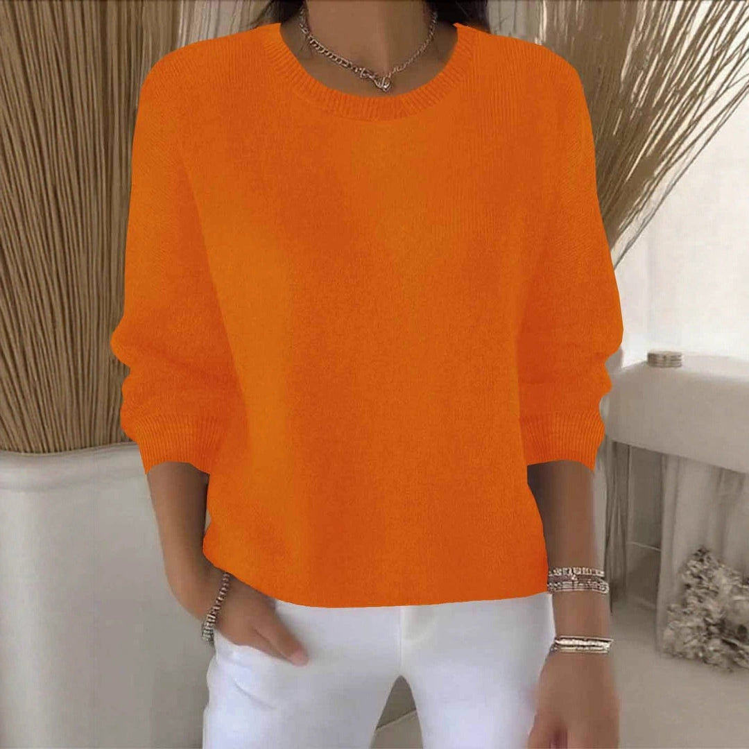 Cozy women's flowy sweater. Relaxed fit knit top, ideal for casual everyday layering.