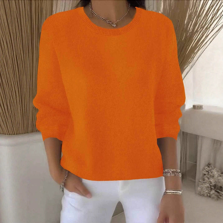Cozy women's flowy sweater. Relaxed fit knit top, ideal for casual everyday layering.