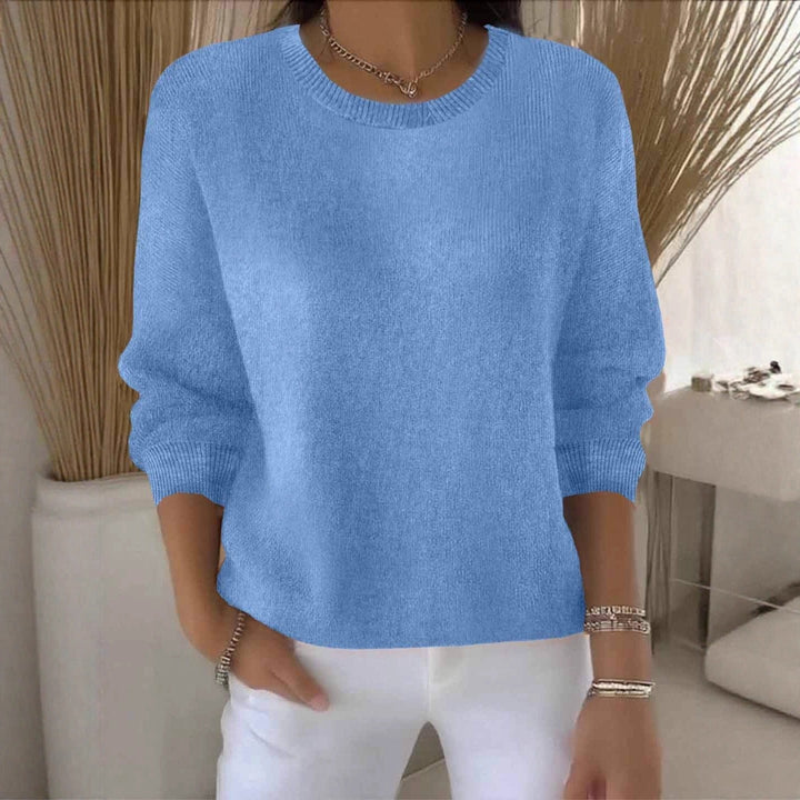 Women's relaxed flowy fit sweater. Cozy knit top, perfect for casual layering & everyday style.