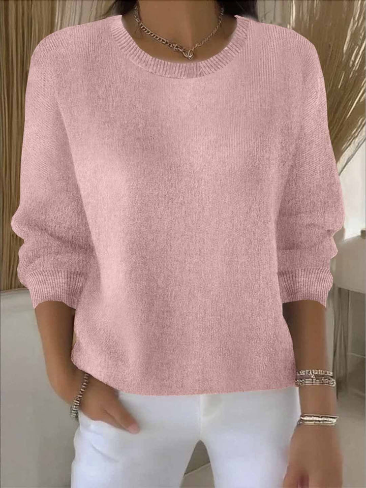 Versatile long sleeve women's sweater. Cozy knit top, perfect for layering & winter style.