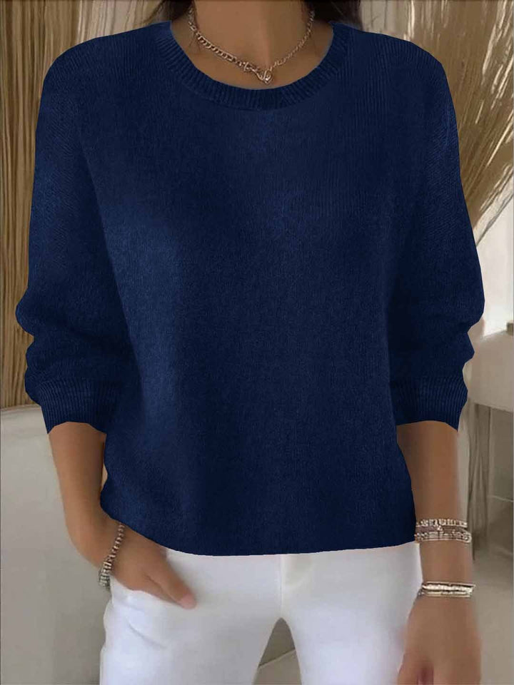 Everyday wear women's flowy sweater. Relaxed fit casual knit top for versatile styling.