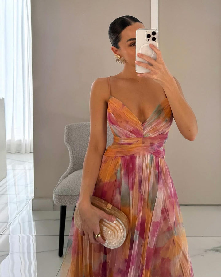 Bohemian style floral print maxi dress for women. Flowy and elegant, ideal for summer.