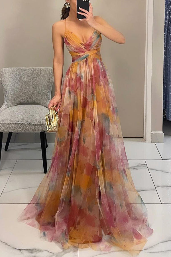 Vibrant orange & green floral print maxi dress. Comfortable, flowy, and perfect for summer vacation.