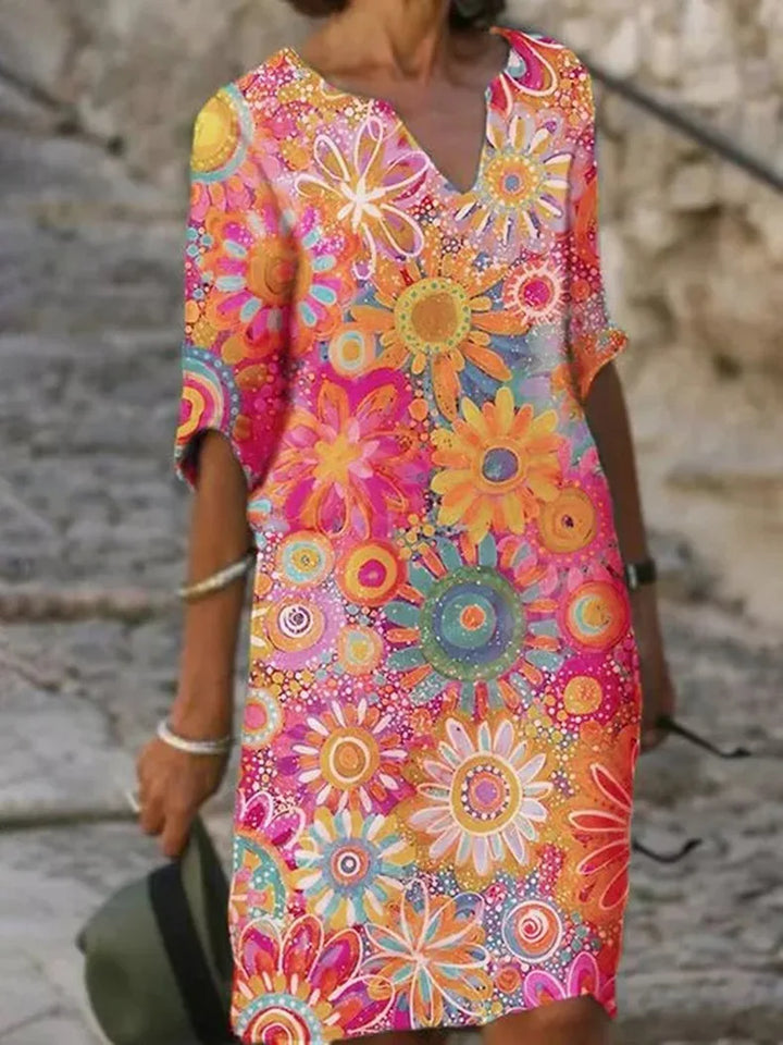 Comfortable women's flowy floral print sleeveless dress. A stylish midi for spring fashion, casual events, or summer outings.