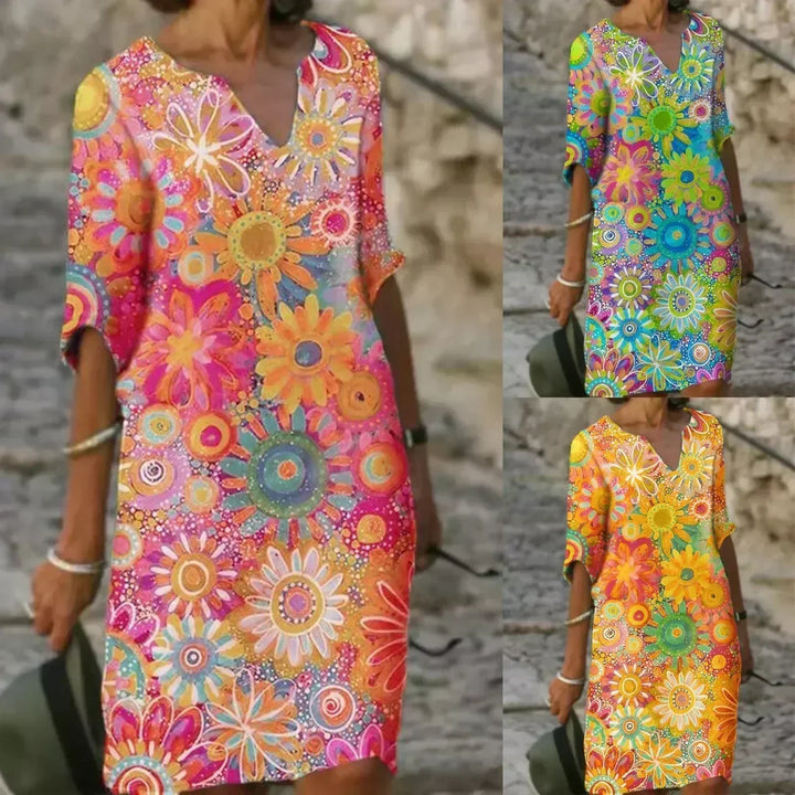 Effortless chic women's floral sleeveless midi dress. Perfect flowy summer dress for casual elegance, spring fashion, or vacation.