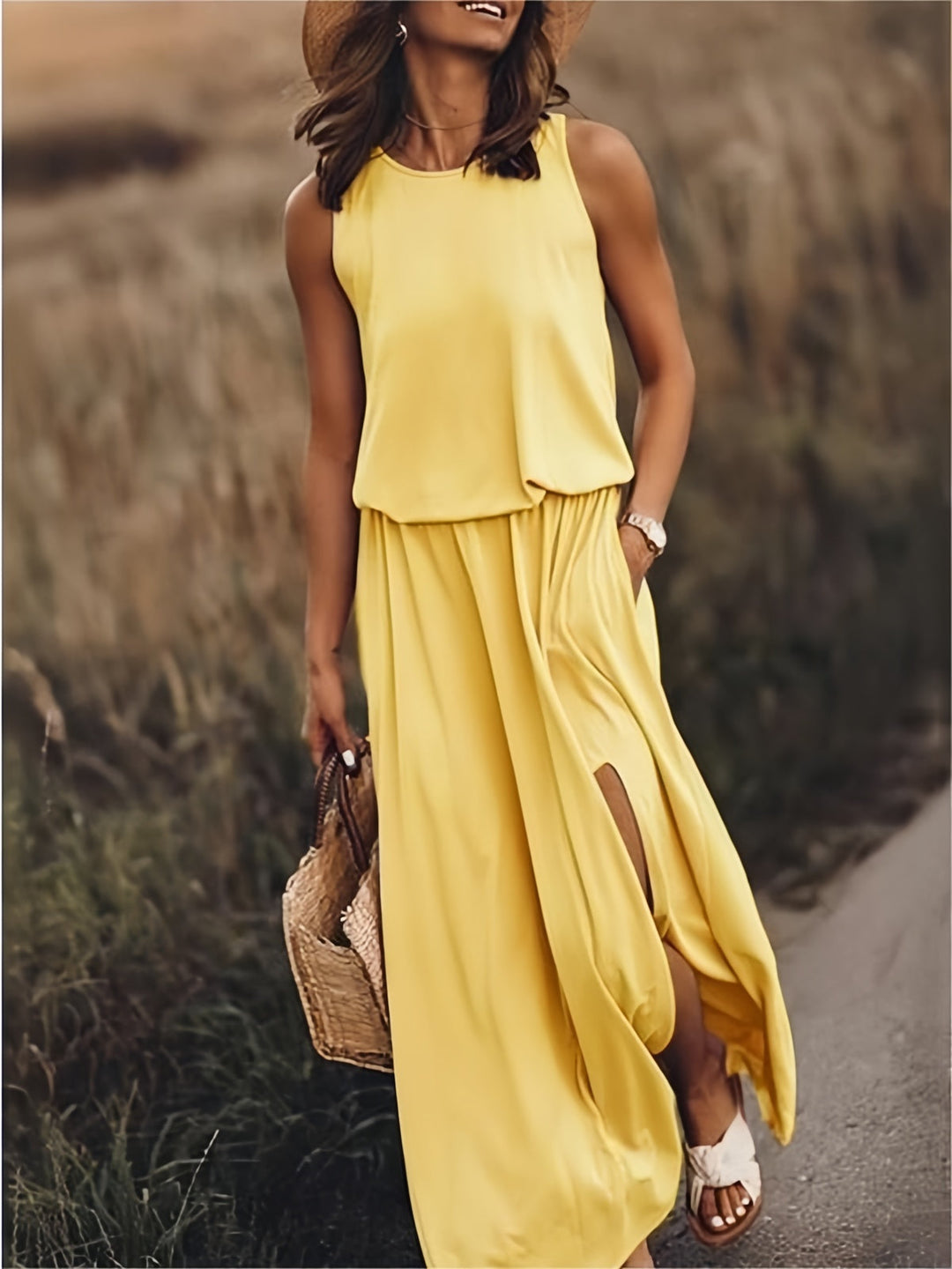 Women's flowy maxi dress with practical pockets & stylish side slit. Perfect for comfortable summer wear.