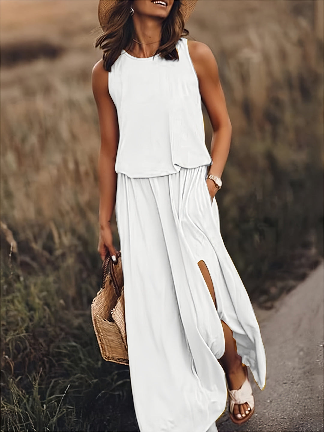 Chic women's vacation maxi dress with a flowy design, side slit & pockets. Great for travel & resort wear.