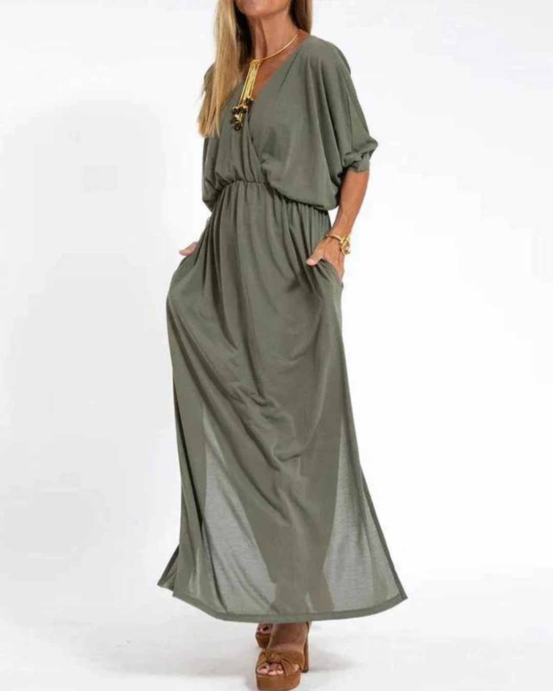 Women's flowy midi dress with adjustable straps, perfect for a comfortable summer look.