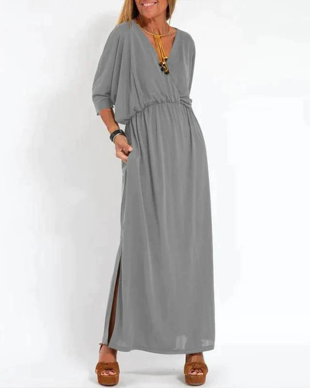 Women's comfortable flowy dress with adjustable straps, perfect for a relaxed summer style.