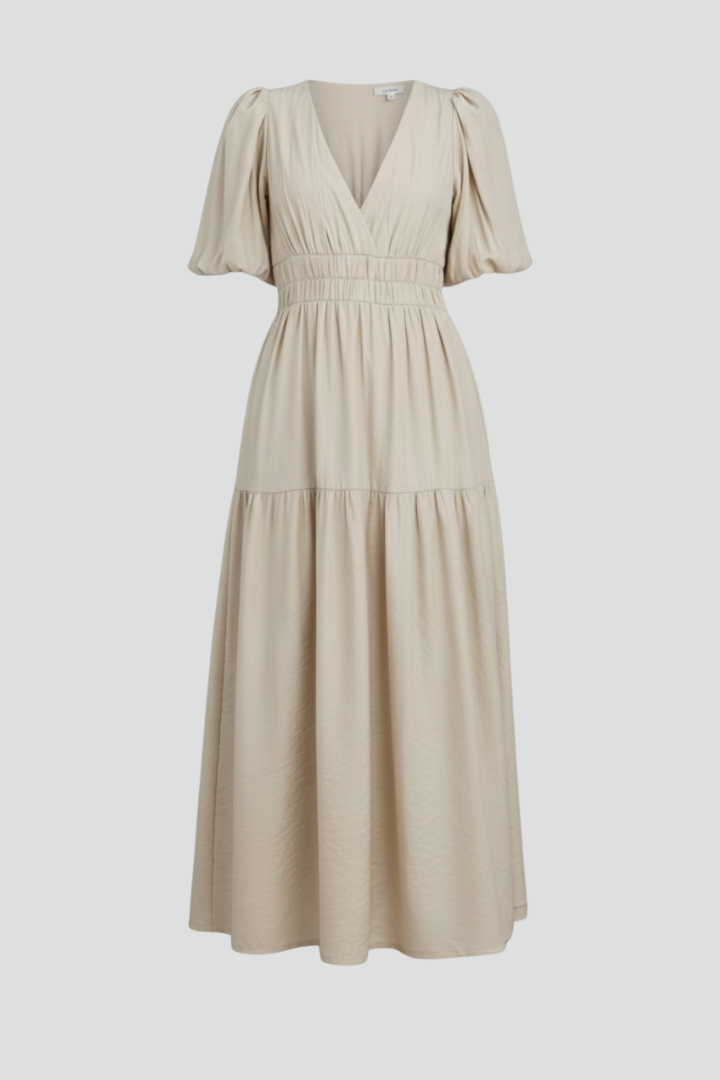 Women's flowy midi dress with V-neck & tiered hem, perfect for versatile elegant wear.