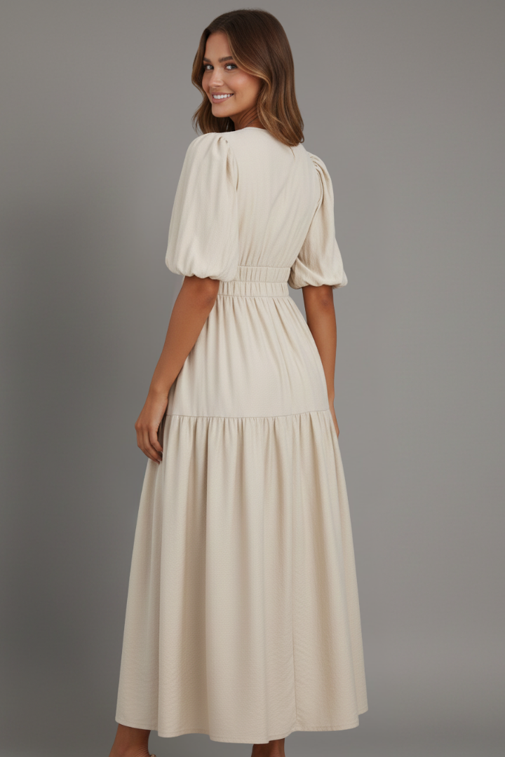 Versatile women's V-neck midi dress with flowy tiered hem, ideal for casual spring or elegant summer events.
