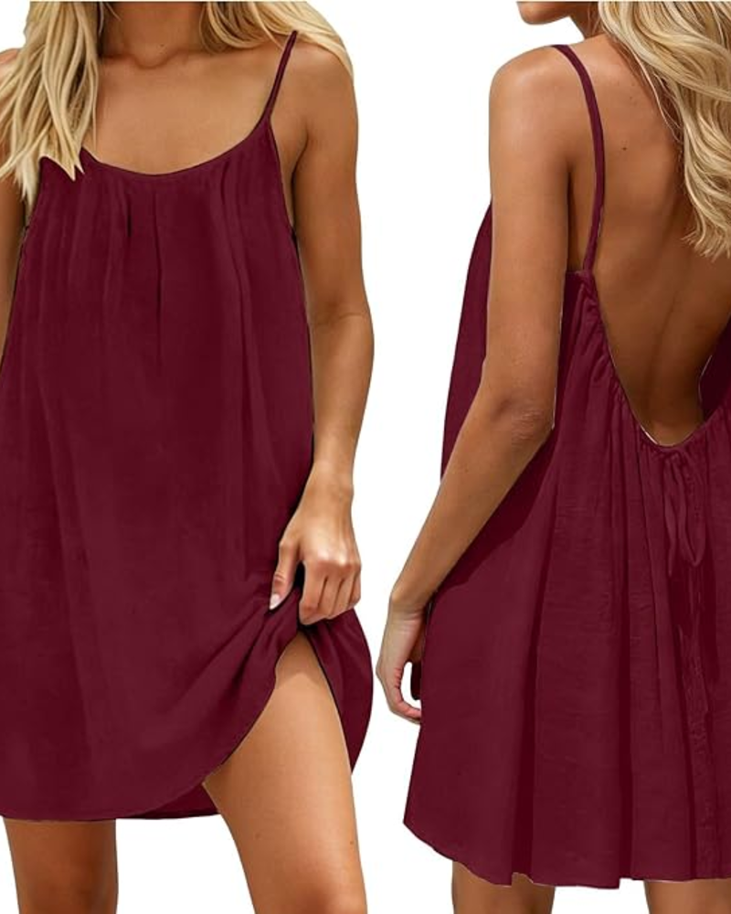 Sunny day ready: Women's open back flowy mini dress, sleeveless and perfect for summer parties.