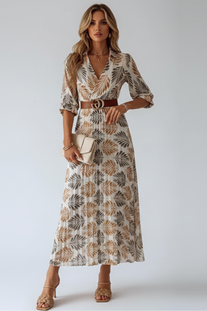 Comfortable women's patterned flowy maxi dress with elbow sleeves, ideal for effortless spring & summer style.