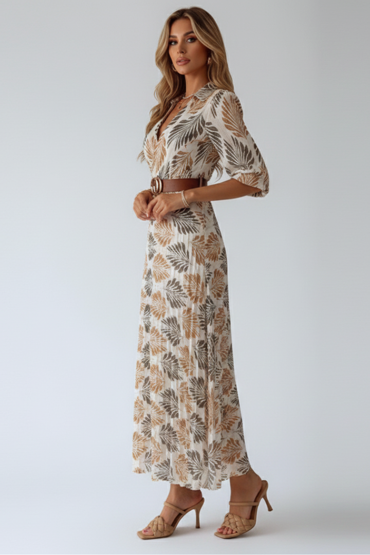 Casual women's patterned maxi dress with elbow sleeves, a comfortable and stylish choice for daytime wear.