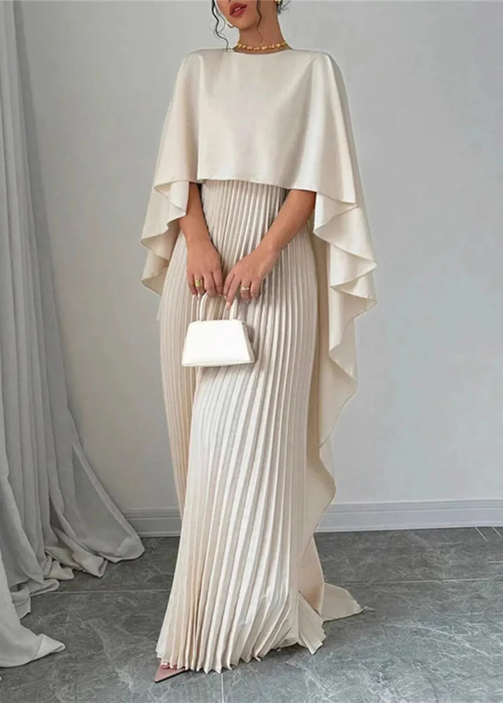 Stunning long flowy pleated dress with a beautiful cape overlay, designed for formal events, evening parties & special occasions.