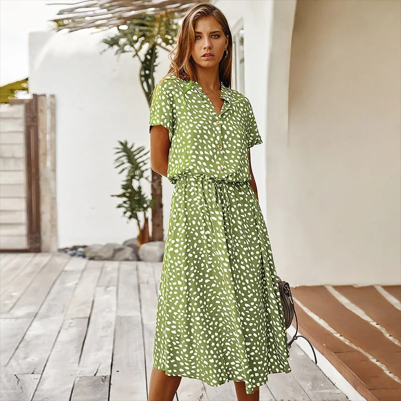 Lightweight women's flowy printed midi dress, a comfortable and stylish sundress for summer days.